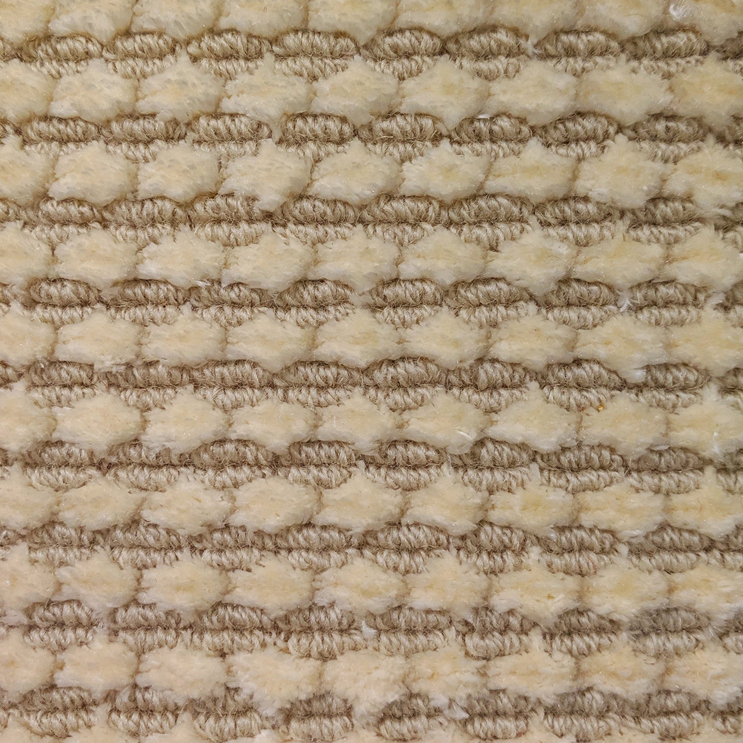 Wool-silk broadloom carpet swatch in a dimensional flat-and-tufted grid weave in beige.