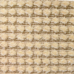 Wool-silk broadloom carpet swatch in a dimensional flat-and-tufted grid weave in tan.