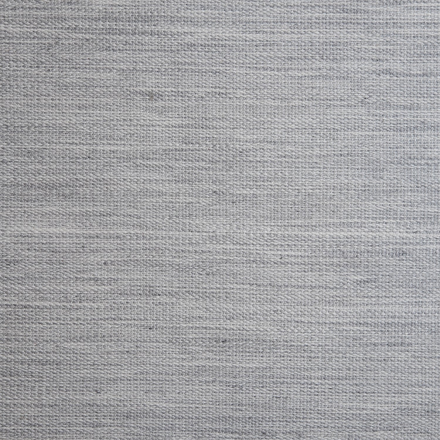 Outdoor broadloom carpet swatch in a flat weave in dove gray.
