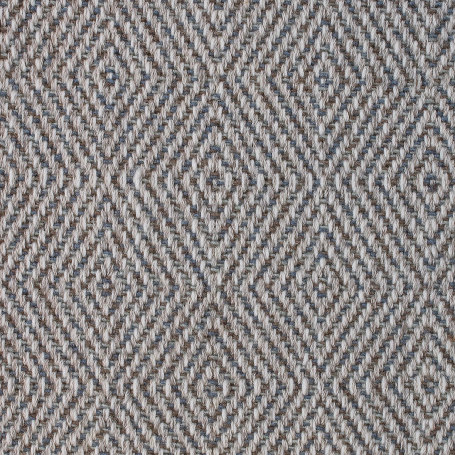 Wool-blend broadloom carpet swatch in a chunky diamond weave in mottled shades of brown, cream and navy.