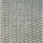 Wool-blend broadloom carpet swatch in a textured lattice print in sable on a sage field.