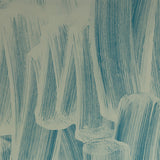 Detail of wallpaper in an abstract paint print in gray on a turquoise field.