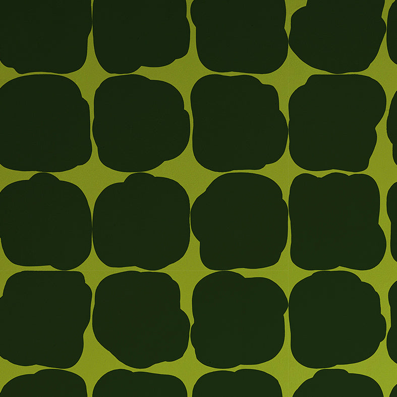 Detail of wallpaper in a repeating blot print in black on an olive field.