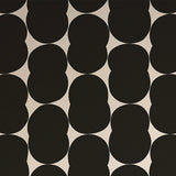 Detail of wallpaper in an abstract curvilinear pattern in black on a white field.