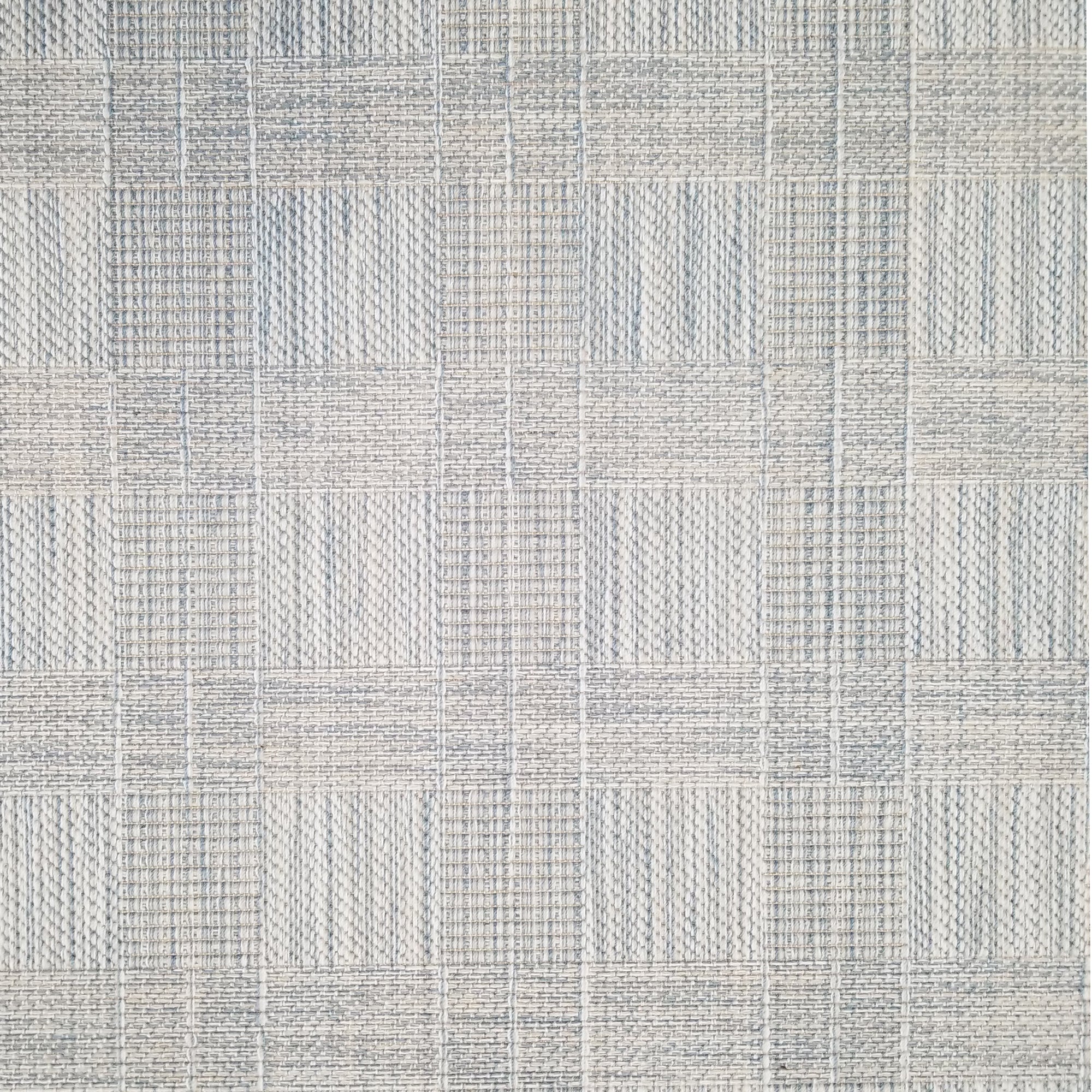 Textured light blue checkered broadloom carpet