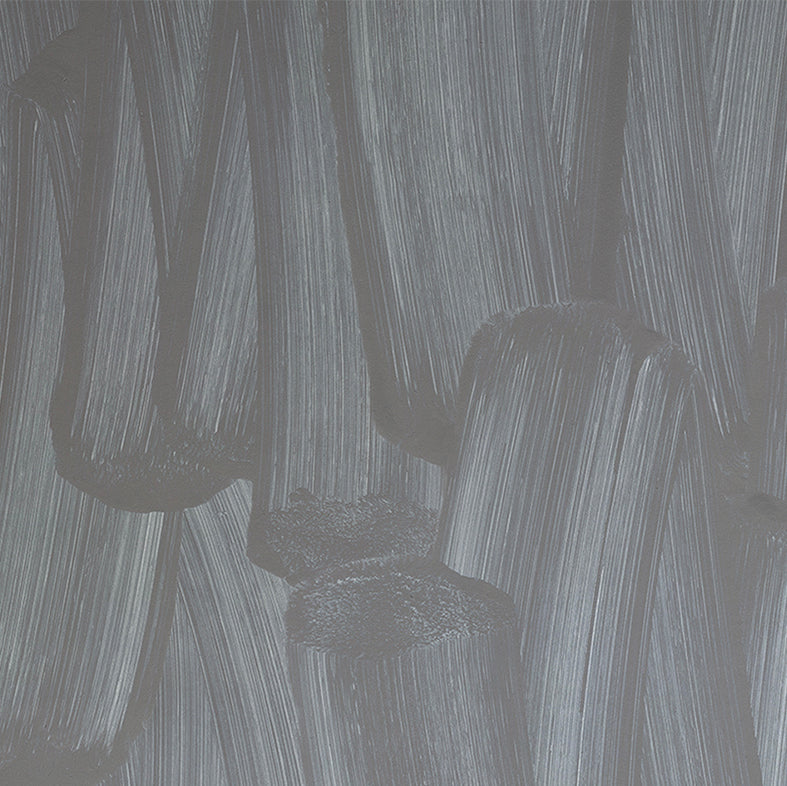 Detail of wallpaper in an abstract paint print in shades of gray.