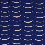 Detail of wallpaper in an abstract crescent print in cream on a navy field.