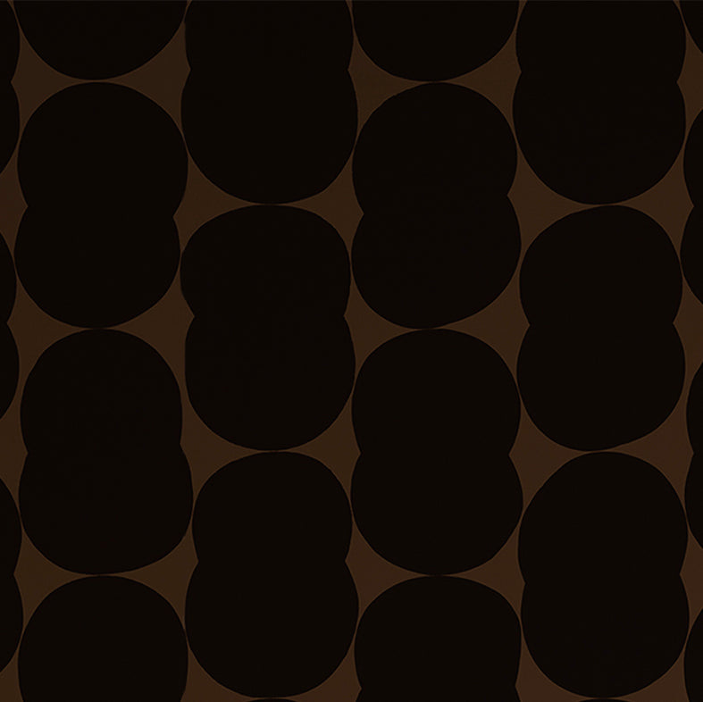 Detail of wallpaper in an abstract curvilinear pattern in black on a brown field.