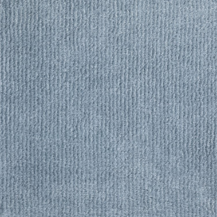 Broadloom carpet swatch in a solid pattern in a light blue design