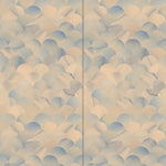 Wallpaper panels in a repeating scalloped print in shades of blue and tan.