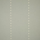 Detail of wallpaper in a minimalist dotted stripe pattern in cream on a gray field.