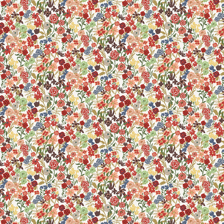 Detail of fabric in a dense small-scale floral print in shades of coral, red, green and blue on a white field.