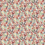 Detail of wallpaper in a dense small-scale floral print in shades of coral, red, green and blue on a white field.