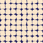 Wallpaper in a repeating blot print in cream on a dark blue field.