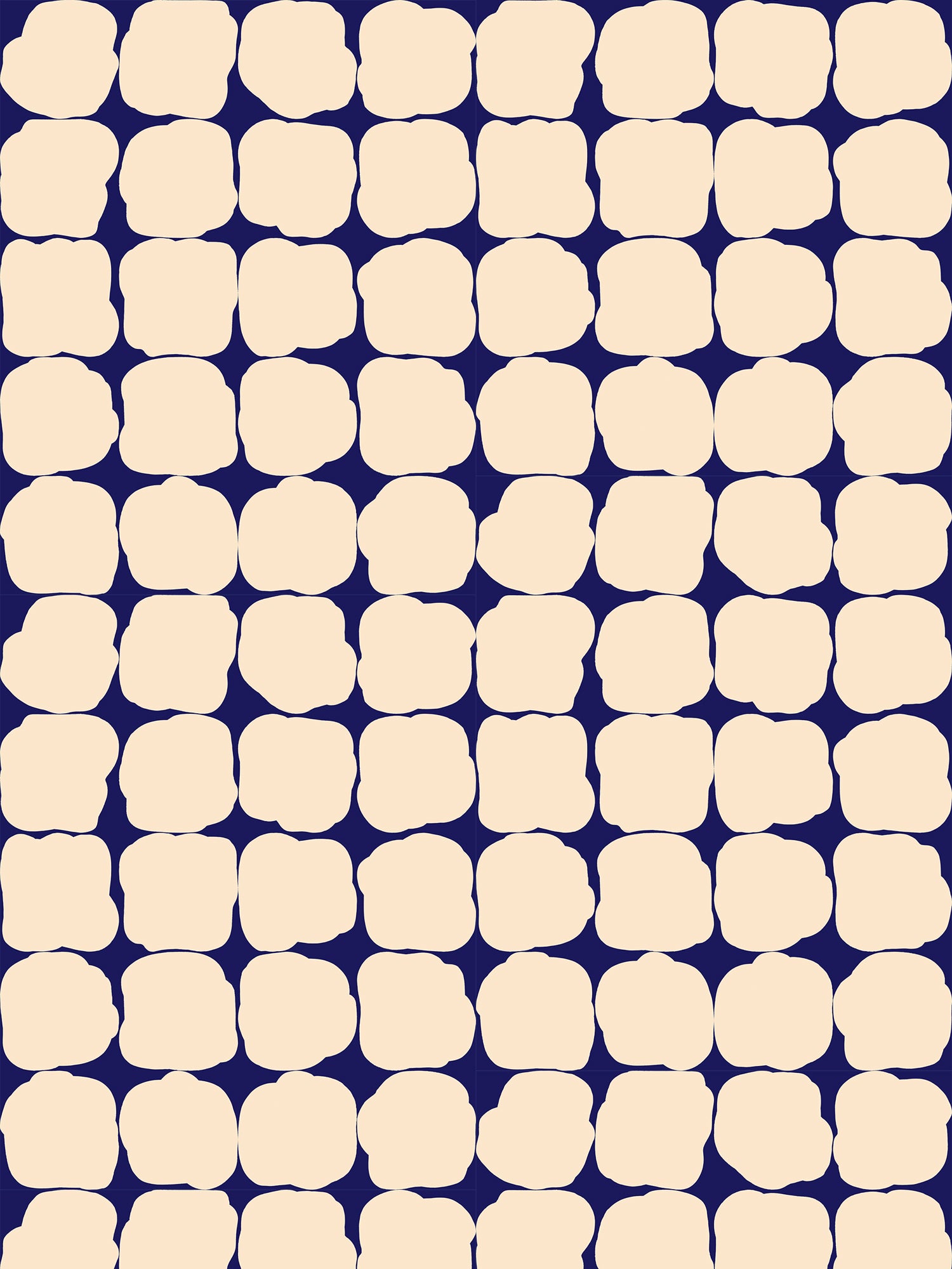 Wallpaper in a repeating blot print in cream on a dark blue field.