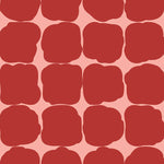 Detail of wallpaper in a repeating blot print in red on a pink field.