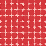 Wallpaper in a repeating blot print in red on a pink field.