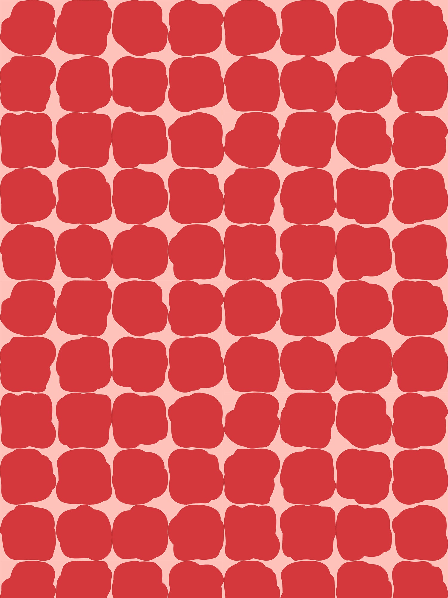 Wallpaper in a repeating blot print in red on a pink field.