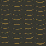 Detail of wallpaper in an abstract crescent print in brown on a black field.