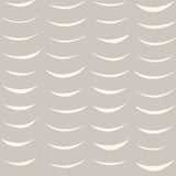 Detail of wallpaper in an abstract crescent print in cream on a gray field.