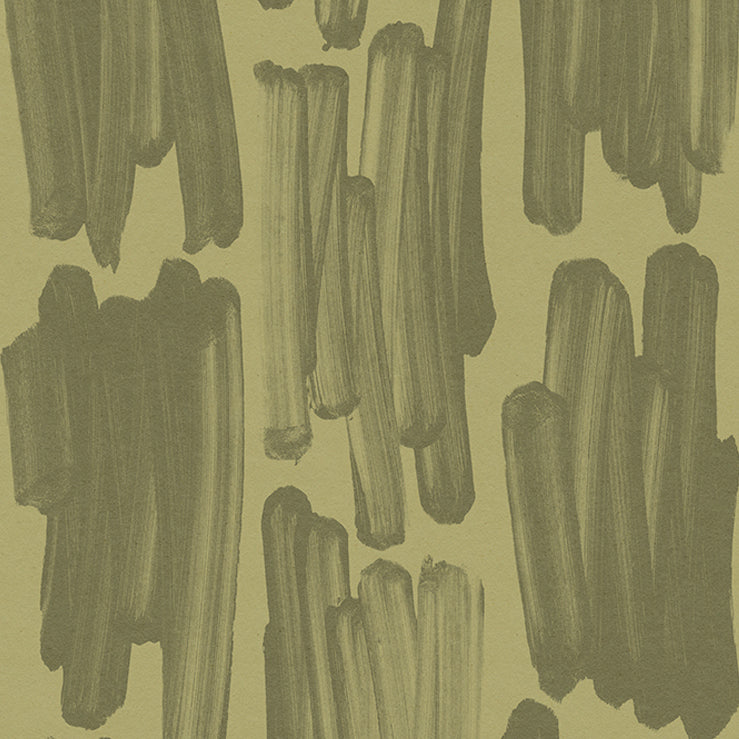 Detail of wallpaper in an abstract paint swatch print in dark green on an olive field.