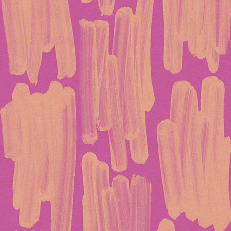 Detail of wallpaper in an abstract paint swatch print in orange on a pink field.