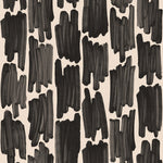 Wallpaper in an abstract paint swatch print in black on a cream field.