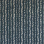 Detail of wallpaper in a repeating striped circular print in cream on a navy field.