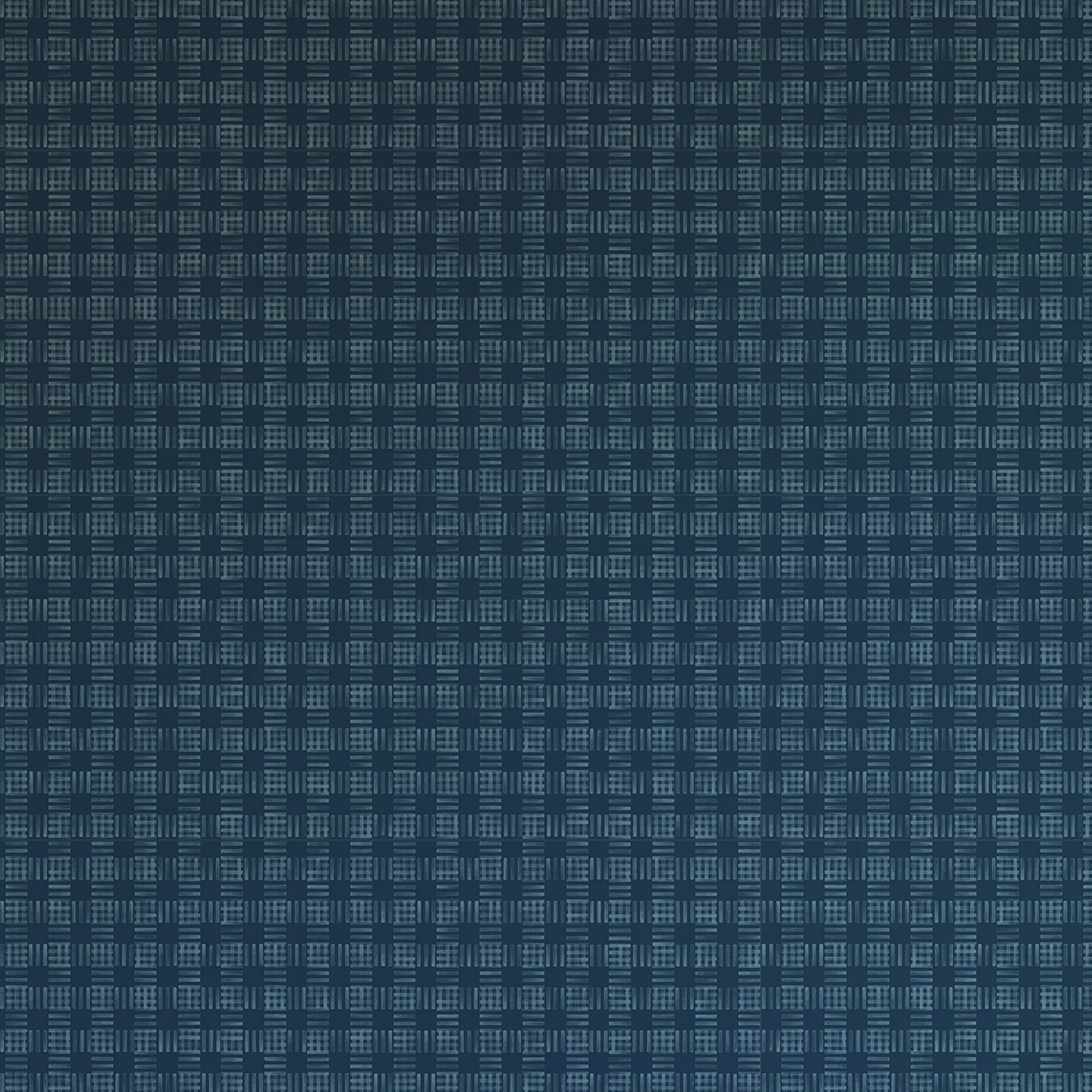 Detail of wallpaper in a dense plaid pattern in shades of navy.