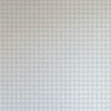 Detail of wallpaper in a dense plaid pattern in shades of light blue and cream.