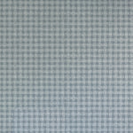 Detail of wallpaper in a dense plaid pattern in shades of blue-gray.