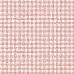 Detail of wallpaper in a dense plaid pattern in shades of cream and red.