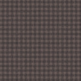 Wallpaper in a dense plaid pattern in shades of brown.