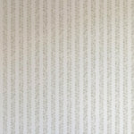 Detail of wallpaper in a repeating striped circular print in gray on a light gray field.