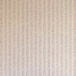 Detail of wallpaper in a repeating striped circular print in purple on a cream field.