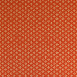 Detail of wallpaper in a minimalist quatrefoil pattern in yellow on a red field.