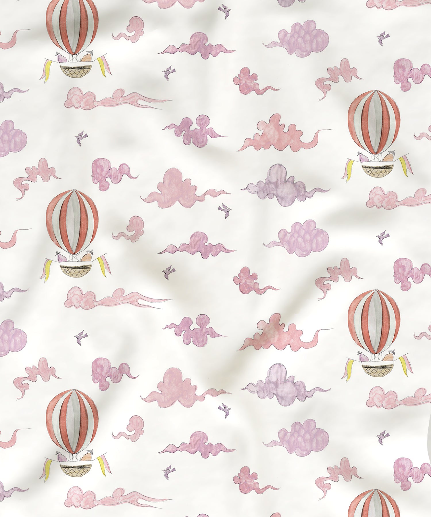 Fabric with pink hot air balloons and clouds pattern on a white background