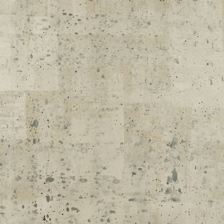 Detail of wallpaper in a minimalist paint slatter print in gray on a tan field.