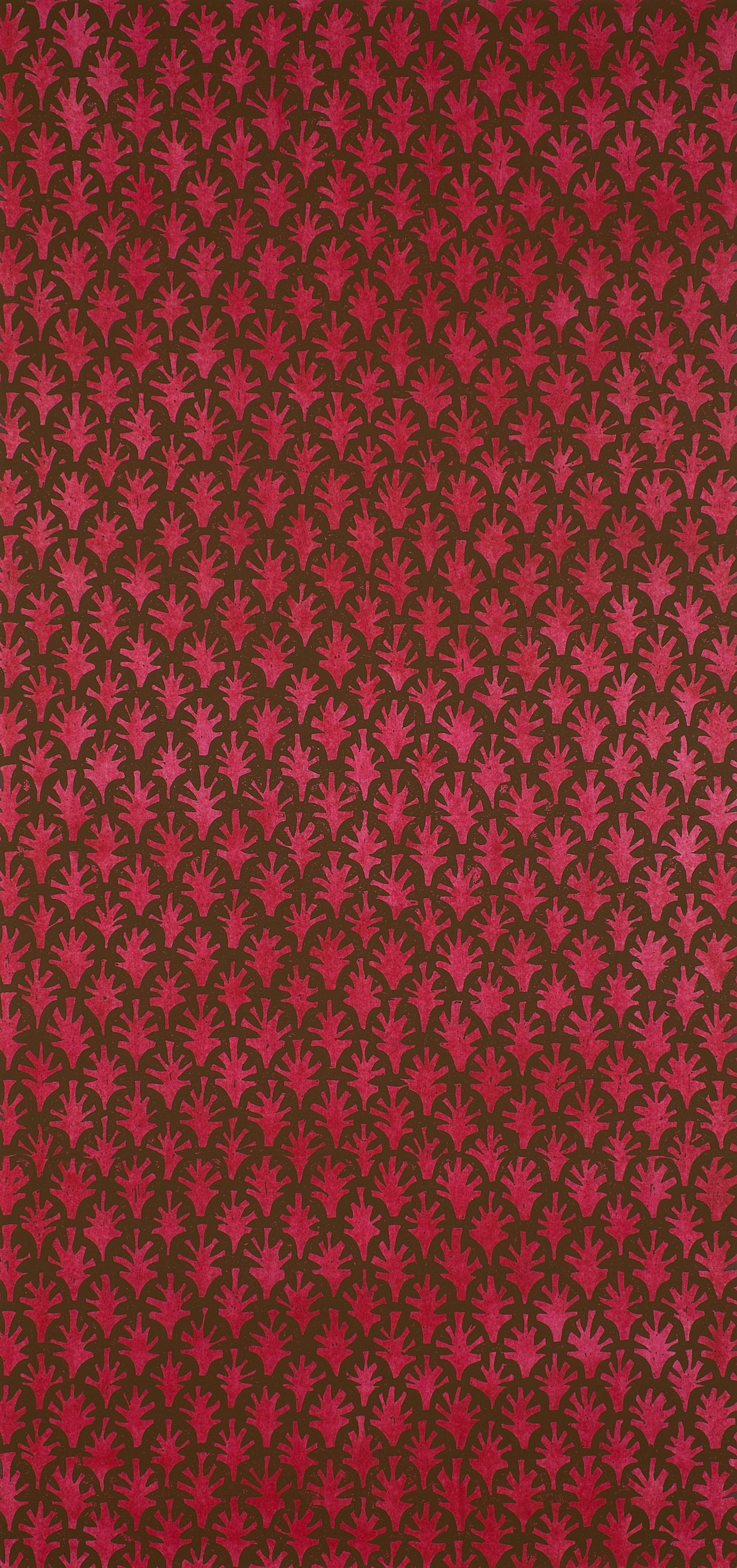 Detail of wallpaper in a repeating botanical grid print in red on a brown field.