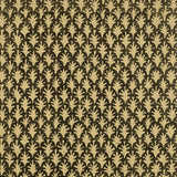 Detail of wallpaper in a repeating botanical grid print in yellow on a black field.