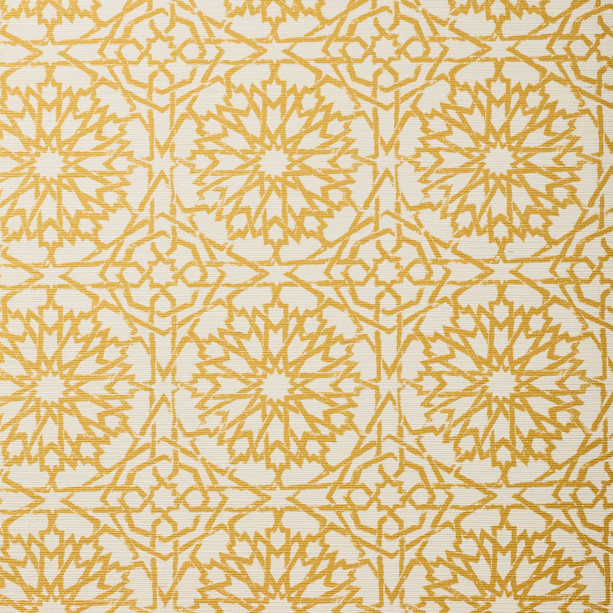 Detail of fabric in a small-scale lattice print in yellow on a cream field.