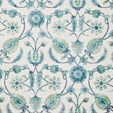 Detail of wallpaper in a floral paisley print in shades of navy and green on a cream field.