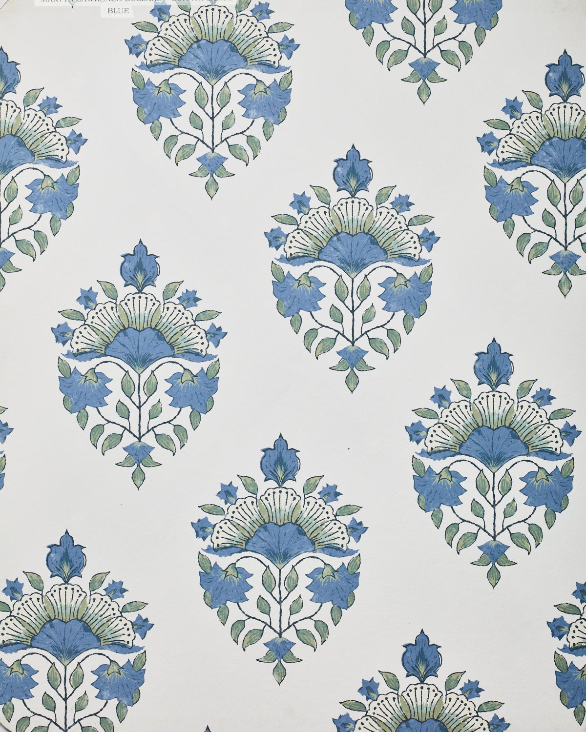 Detail of wallpaper in a floral paisley print in shades of blue and green on a greige field.