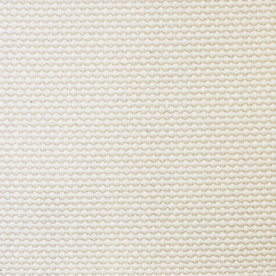 Broadloom carpet swatch in a solid pattern cream color