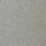 Broadloom carpet swatch in a solid pattern light grey color