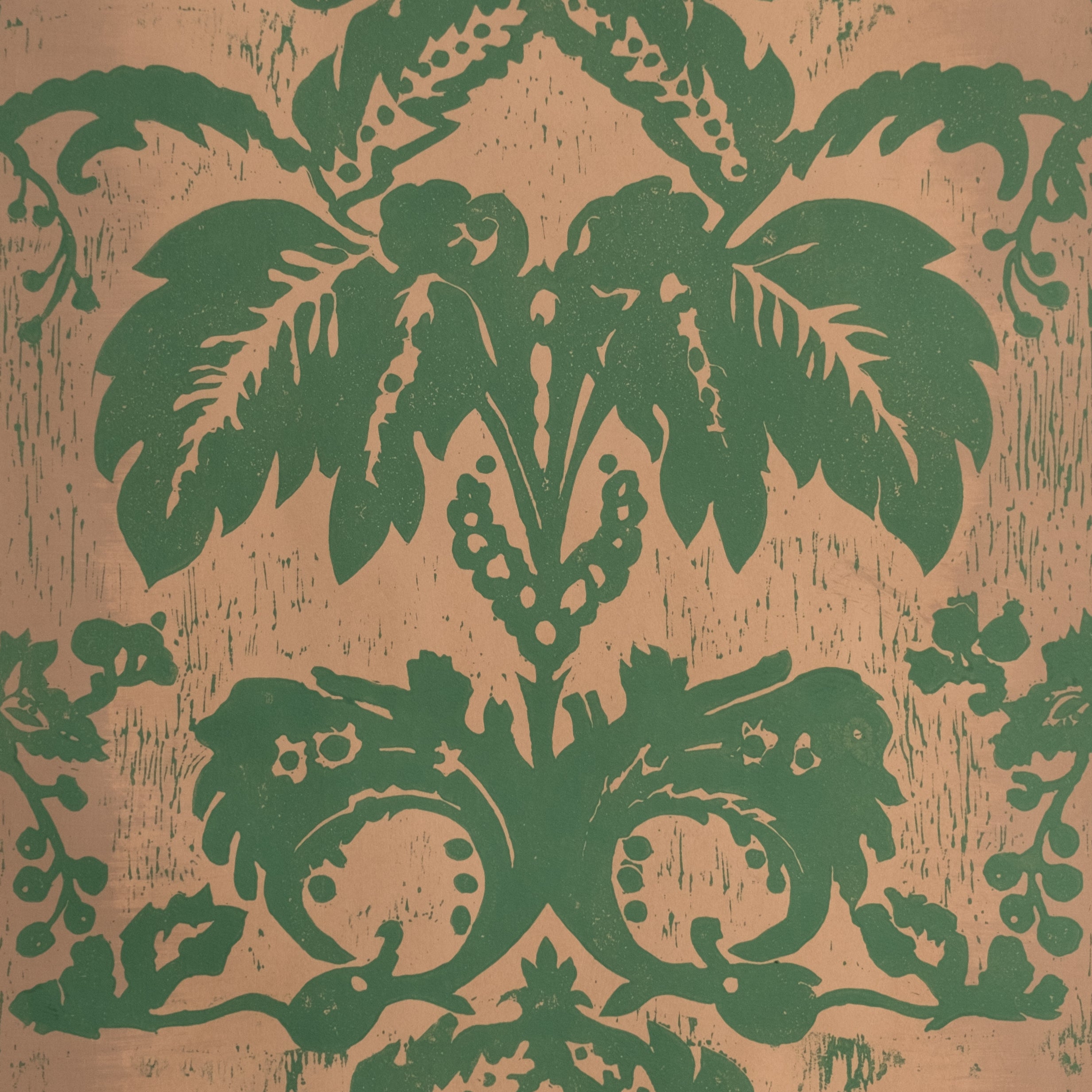 Detail of wallpaper in a repeating floral damask pattern in green on a tan field.