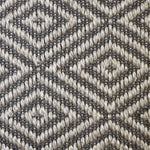 Broadloom carpet swatch in diamond pattern grey white color