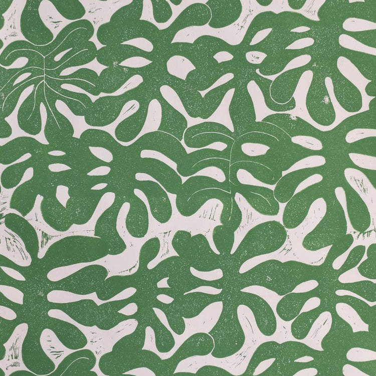 Detail of a leaf pattern in kelly green and white. 