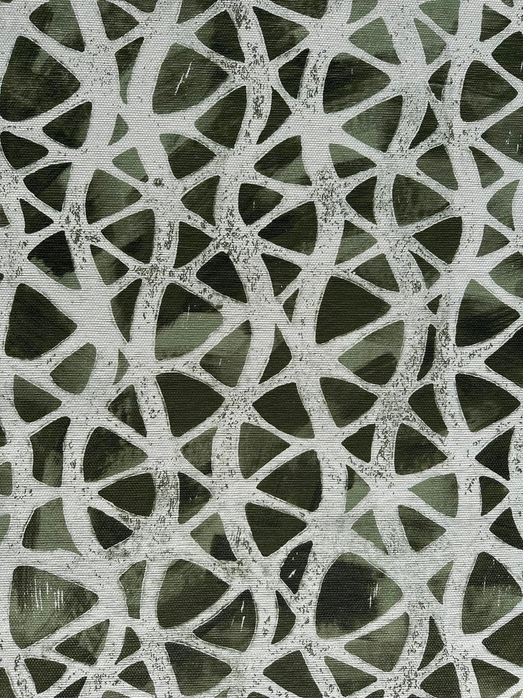 Detail of fabric in an abstract grid print in gray on a mottled dark green field.