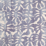 Detail of wallpaper in a playful repeating leaf print in mottled purple on a cream field.